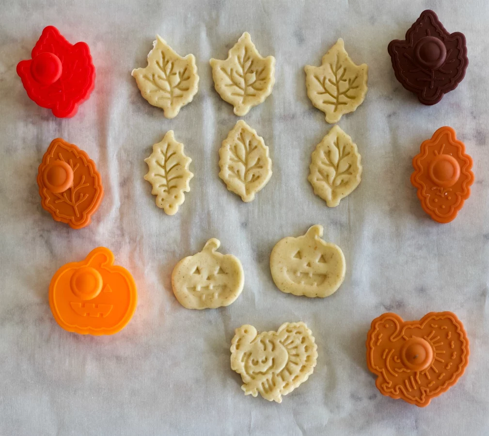 Pie Dough Cut Outs And Stamps With The Raw Dough Shapes They Create