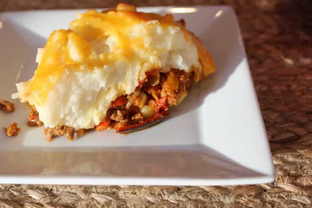 Shepherd's Pie Has A Hamburger Filling Spiced With A Southwestern Flair, Topped With Creamy Mashed Potatoes And Melted Shredded Cheese. A Comforting, Filling Casserole. Http://Homemadefoodjunkie.com