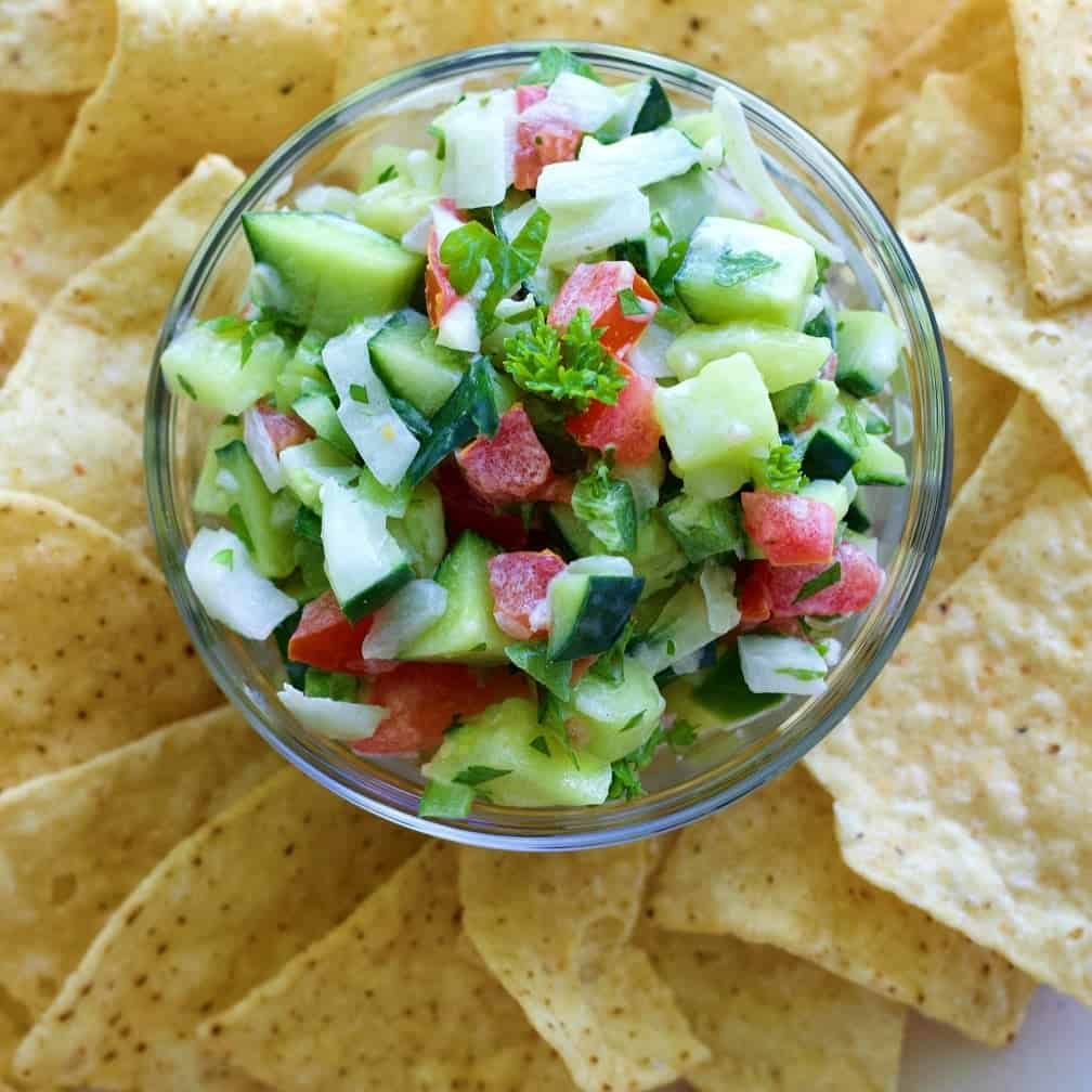 Cucumber Salsa And Chips Is Amazing Together. Try This For Your Next Party!