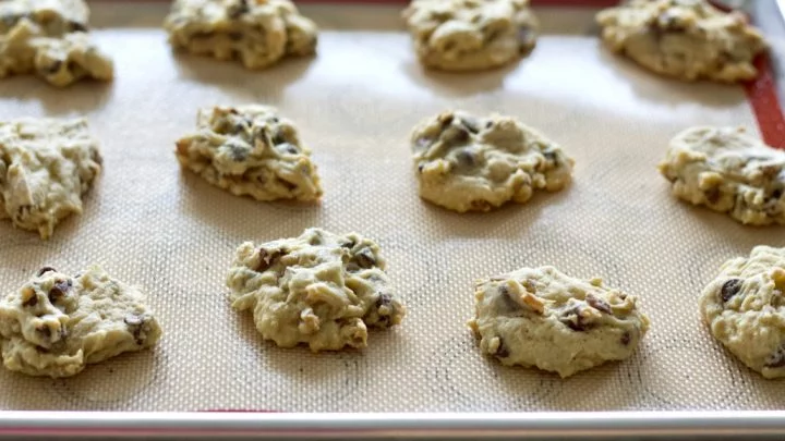 Fresh Baked Creamy Chocolate Cookies On A Baking Sheet