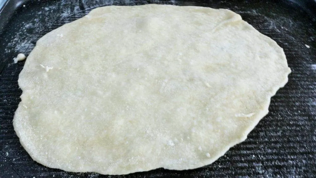 Homemade Flour Tortilla Laying On A Griddle