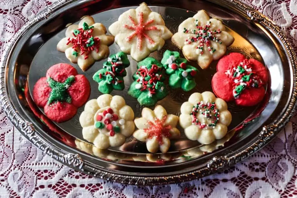 Spritz Cookie Recipe With Colored Doughs And Sprinkles.