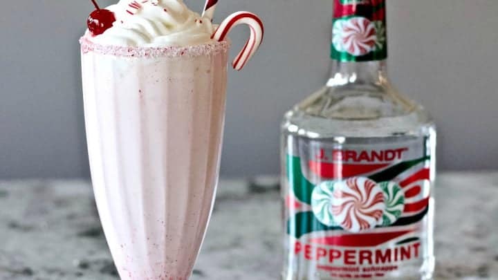 Peppermint Milkshake With A Schnapps Liqueur Bottle