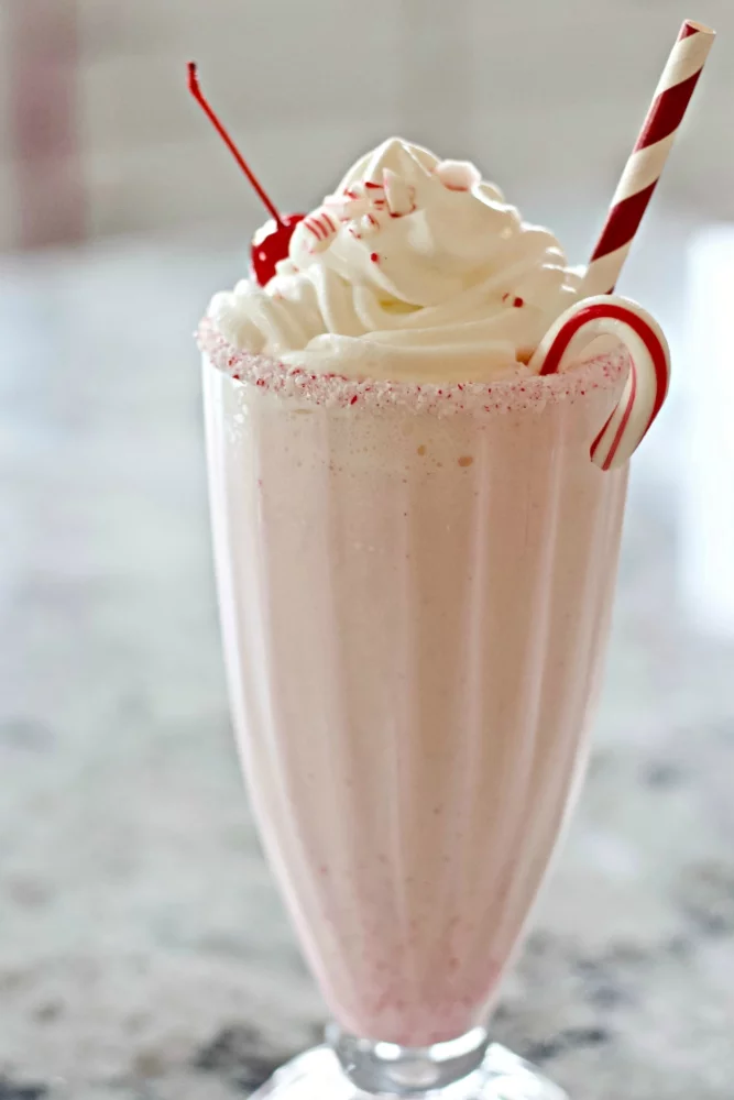 Peppermint Milkshake With Schnapps Recipe 2 Peppermint Schnapps Milkshake In A Soda Glass Garnished With Whipped Cream, A Candied Cherry, Crushed Peppermint Candy, A Mini Candy Cane And Straw.