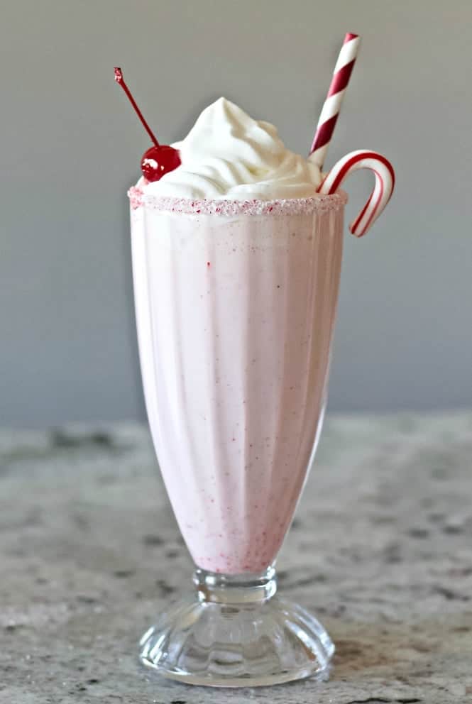 Peppermint Milkshake With Schnapps Liqueur In A Candy Rimmed Soda Glass