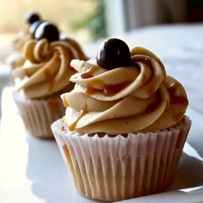 Heavenly Coffee Cupcakes Salted Caramel Frosting 1 Coffee Cupcake Salted Caramel Buttercream Frosting Adorable Coffee Cupcakes With Salted Caramel Frosting. These Cupcakes Have A Wonderful Coffee Overtone Topped Off With A Delicious Hint Of Salted Caramel In A Beautiful And Rich Frosting. Http://Homemadefoodjunkie.com