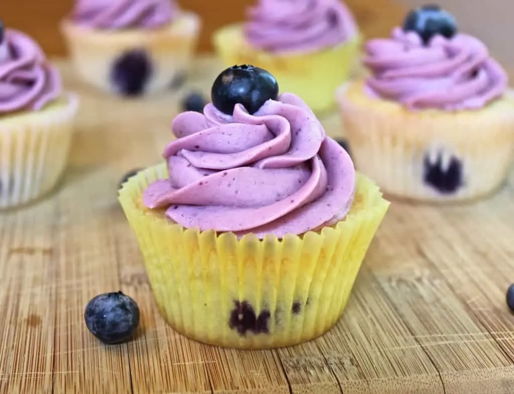 Delicious Blueberry Lemon Cupcakes With Blueberry Frosting. Mde Entirely From Scratch! Http://Homemadefoodjunkie.com