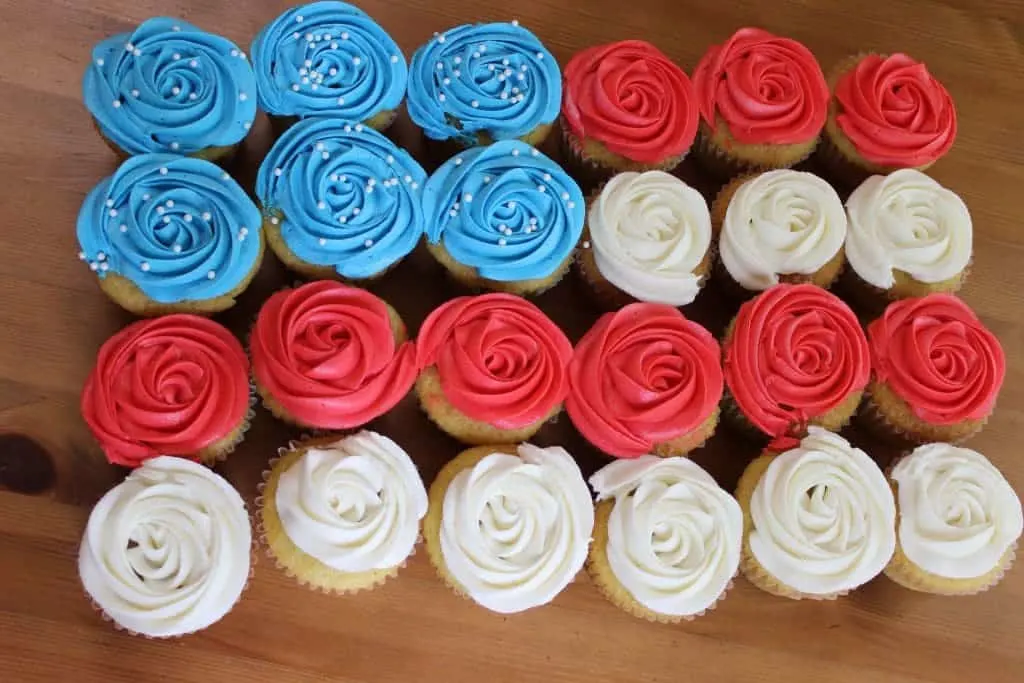 Festive Cherry Almond Cupcakes. A Delicious Almond Cupcake Topped With A Silky Cherry Buttercream Frosting!