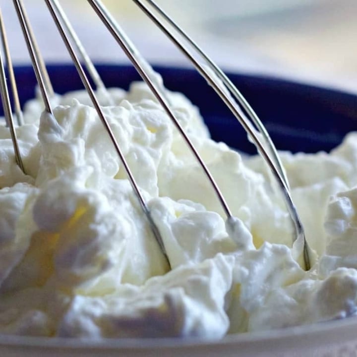 Homemade Greek Yogurt so easy to make and saves you HALF the money of store bought! http://homemadefoodjunkie.com