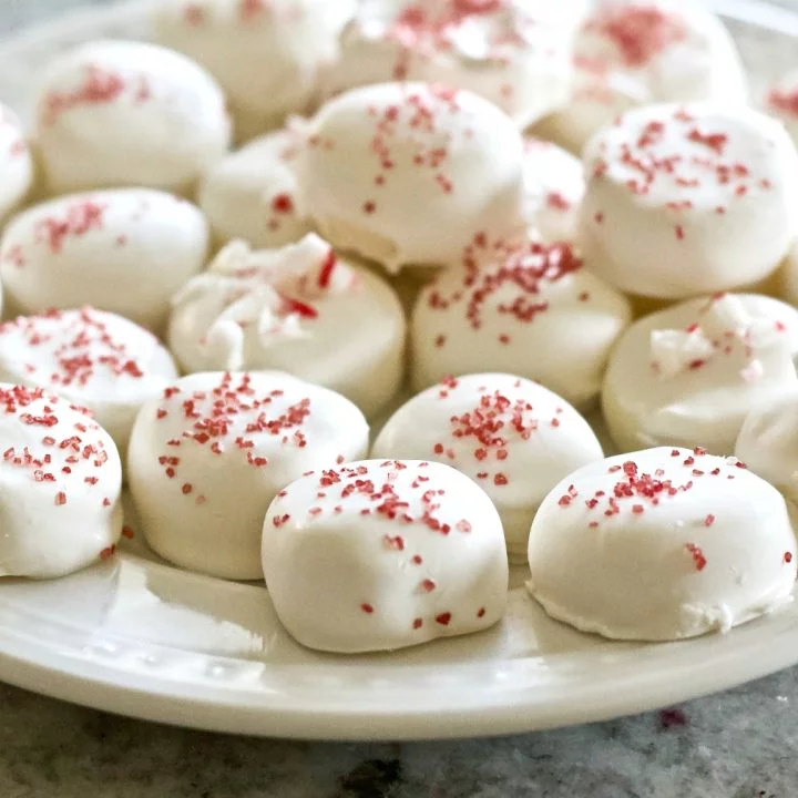 Holiday Candies with white chocolate and red sprinkles