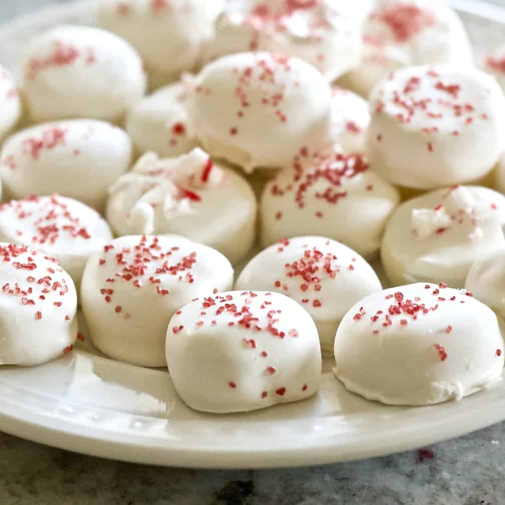 Holiday Candies With White Chocolate And Red Sprinkles