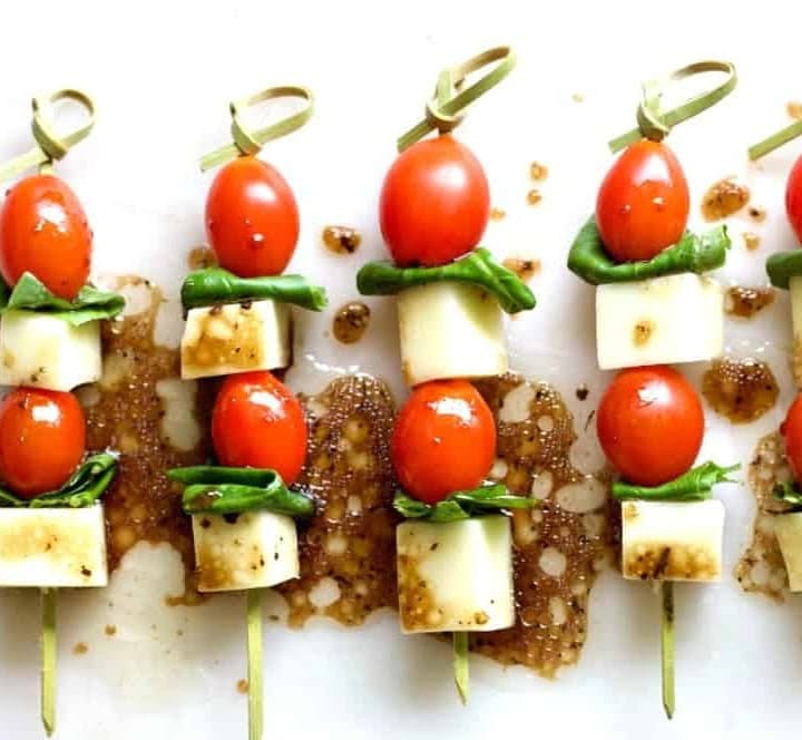 caprese appetizers on a party tray