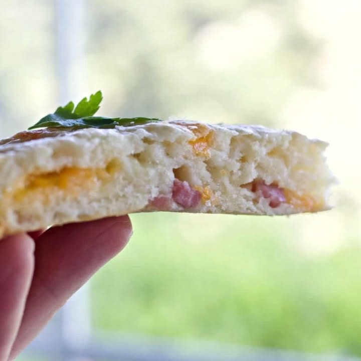 Ham and Cheese Scone in a hand