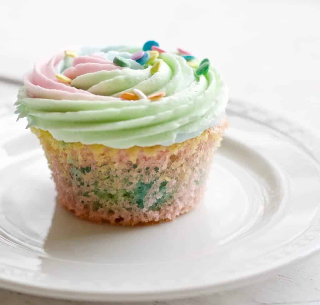 These Adorable Multi Colored Rainbow Cupcakes Are Delicious, Super Cute And Easy To Make! Colorful And Fun, They Are Sure To Be A Hit At Any Gathering.