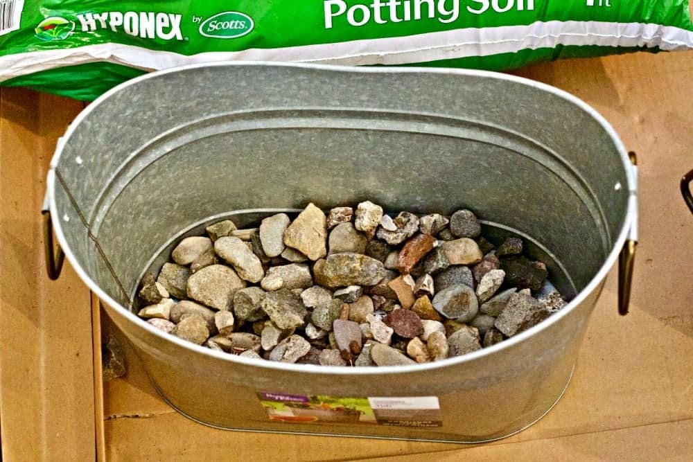 Simple Container Gardening Tips 9 Rocks For Drainage In Container Garden