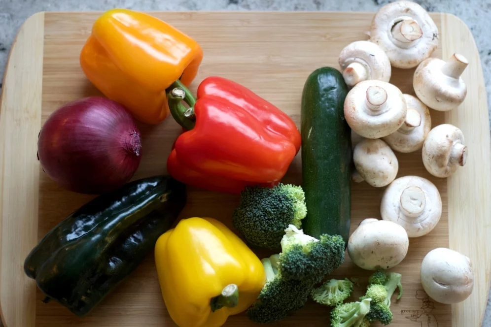 Healthy Roasted Vegetables Recipe 2 Fresh Vegetables For Roasting On A Sheet Pan. Red Onion, Sweet Red Pepper, Roasting Pepper, Zucchini, Broccoli And White Mushrooms.