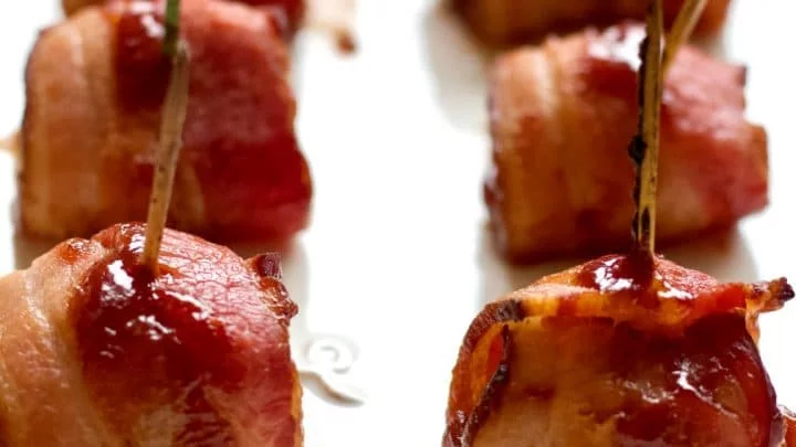 Bacon Wrapped Water Chestnuts Appetizers 6 Bacon Wrapped Water Chestnuts On A Serving Tray