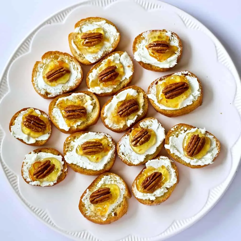 A Party Tray Loaded With Crostini Appetizers