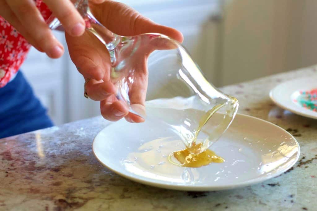 Rimming The Glass With Honey.