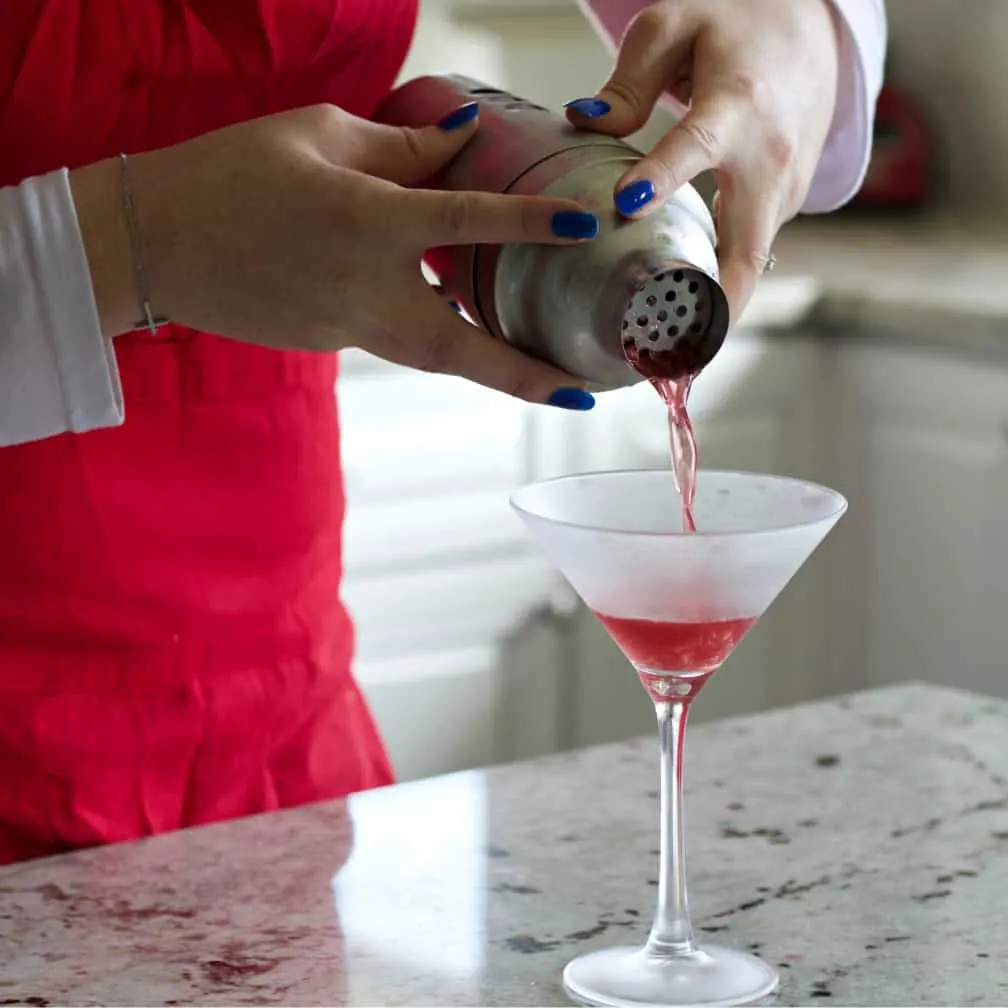 Pouring The Washington Apple Into A Martini Glass