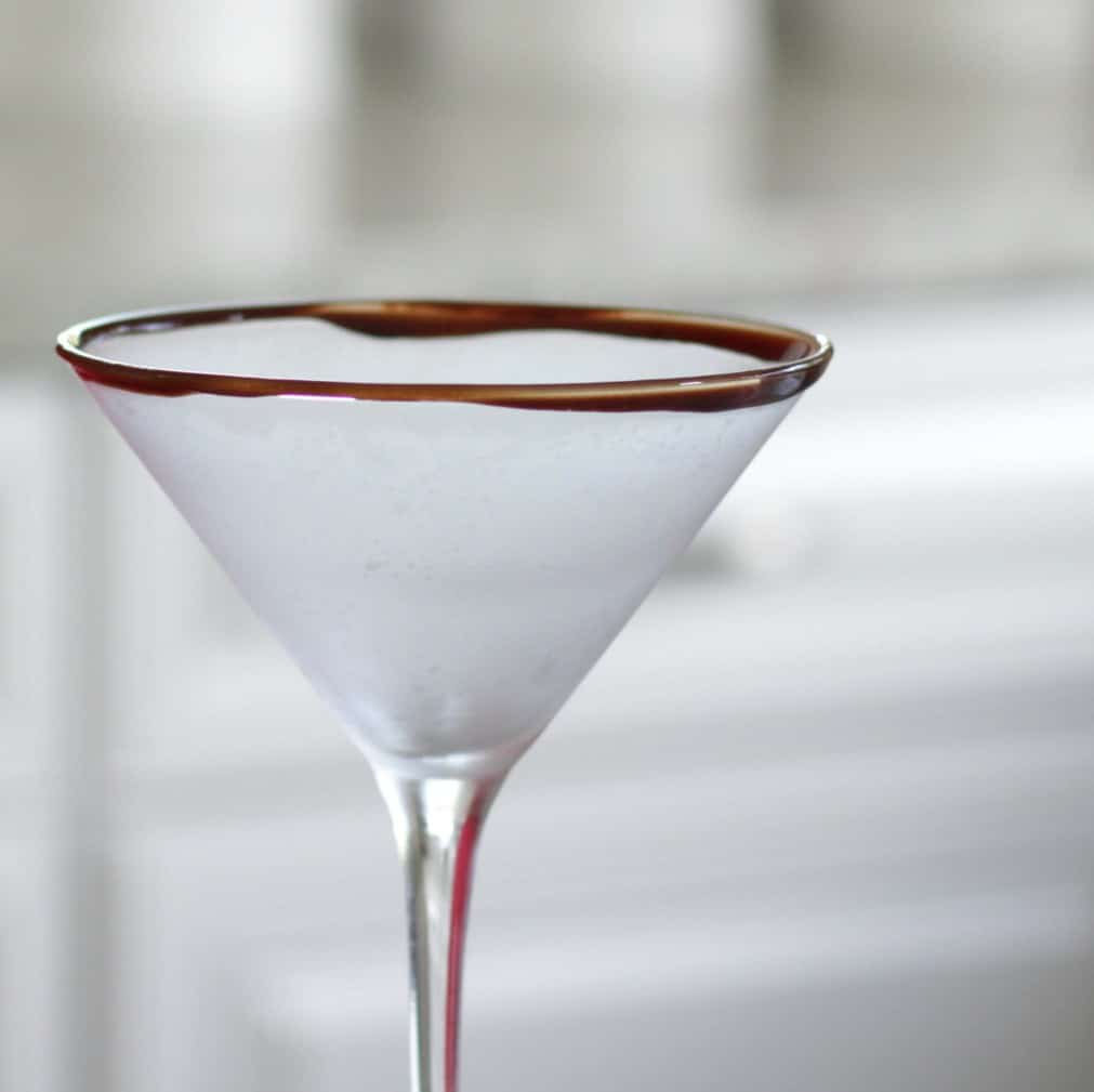 A Chocolate Syrup Rim On A Martini Glass