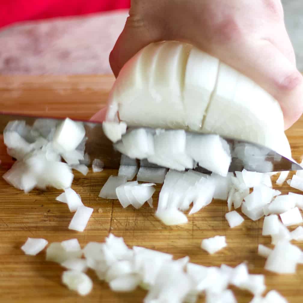 Dicing An Onion On A Cutting Board