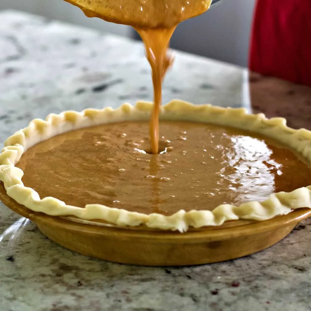 Sweet Potato Pumpkin Pie Recipe 22 Sweet Potato Pumpkin Pie-Pouring Batter In Pie Shell