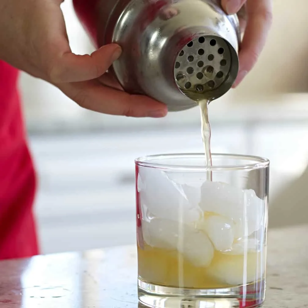 Pouring A Amaretto Sour