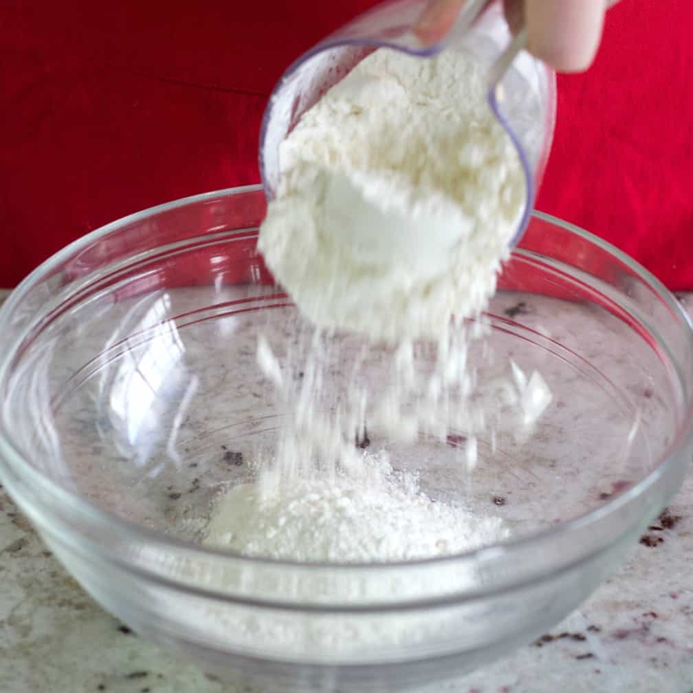 Pouring Flour Into Mixing Bowl For Puff Pastry