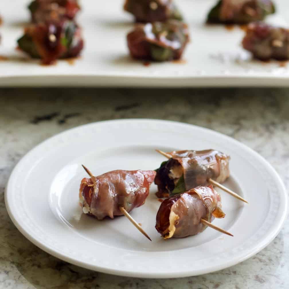Prosciutto Wrapped Dates With Goat Cheese And Fresh Basil