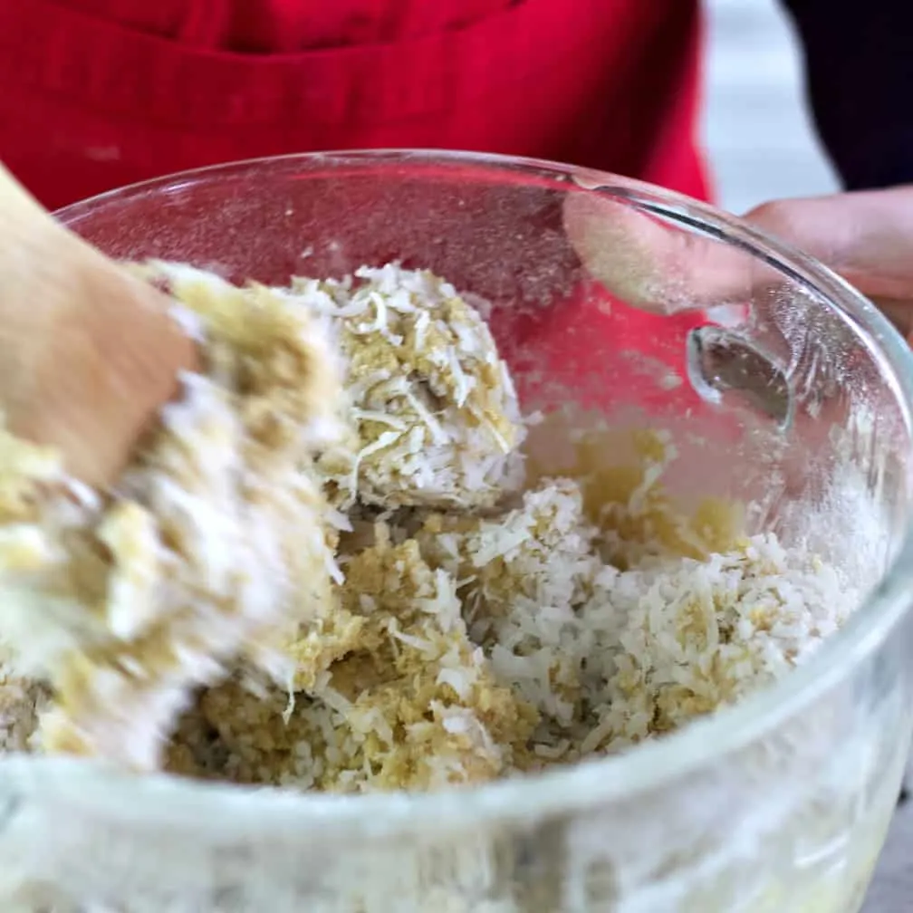 Stirring Coconut Into Almond Joy Cookie Dough