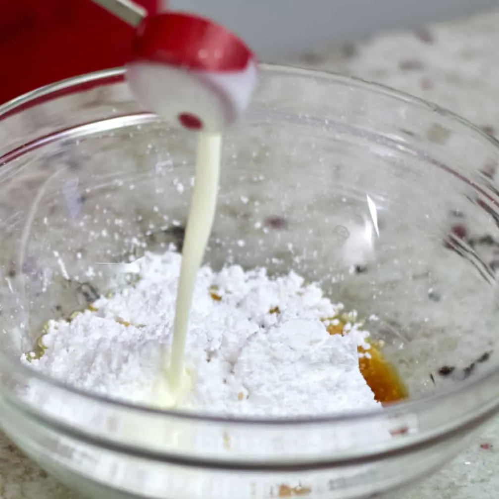 Pouring Heavy Cream Into Bowl.