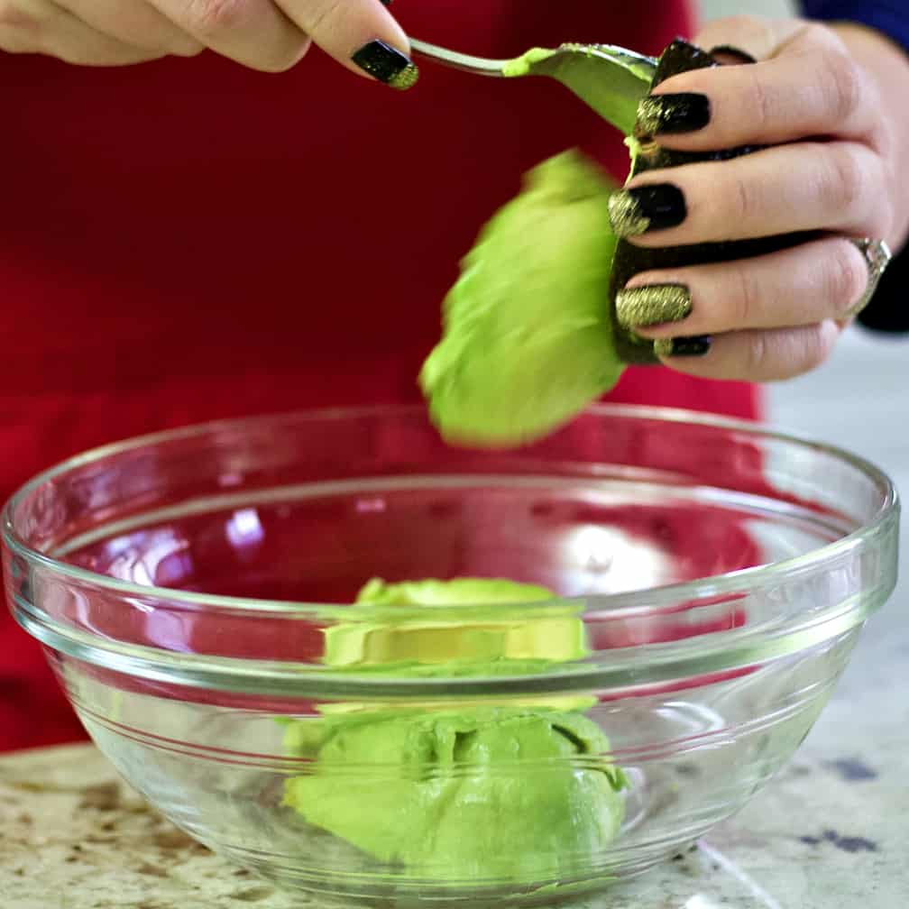 Scooping Avocado Pulp Out Of The Skin