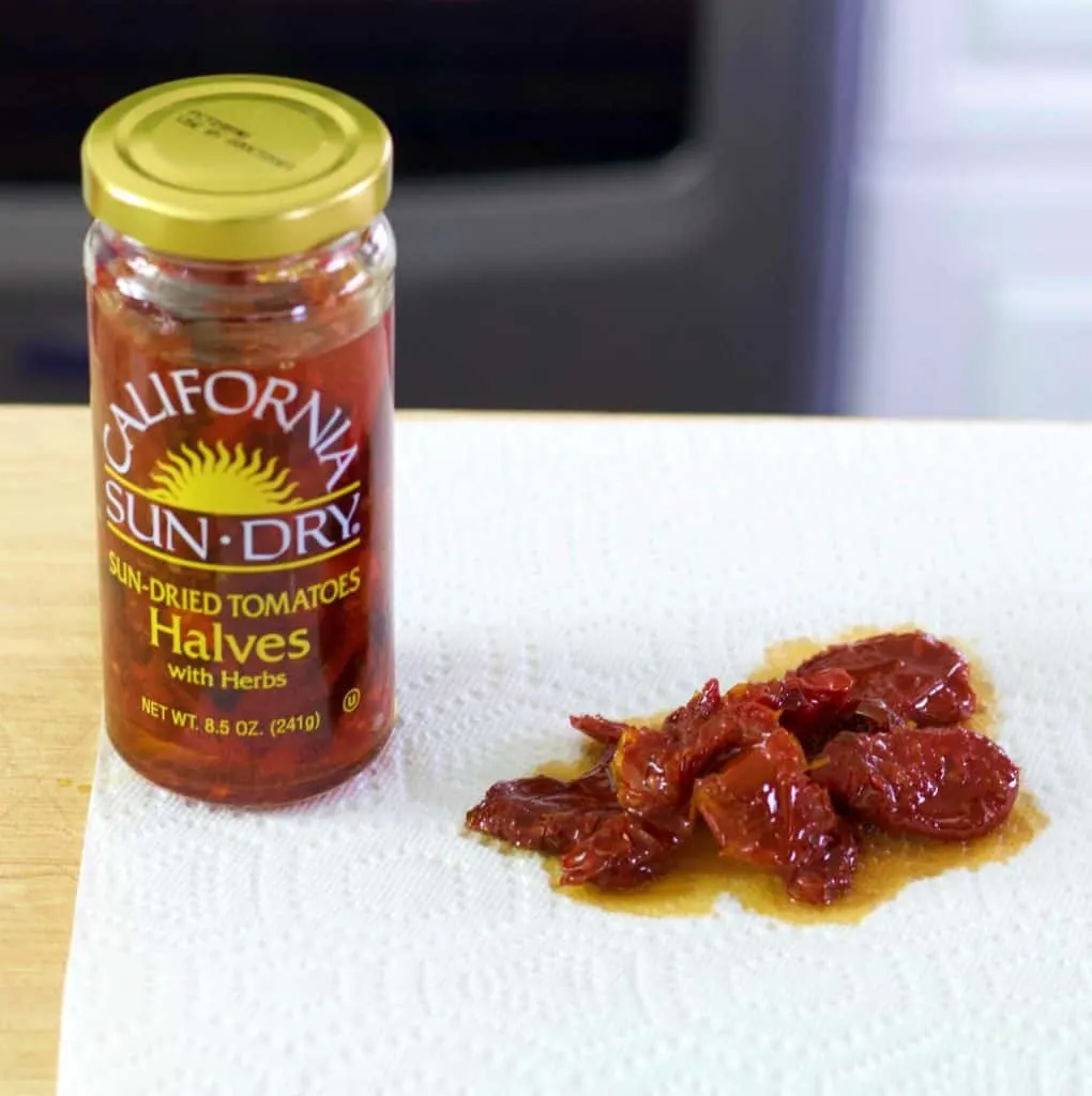 Sun Dried Tomatoes And Jar On A Paper Towel. Keto Soup Recipe