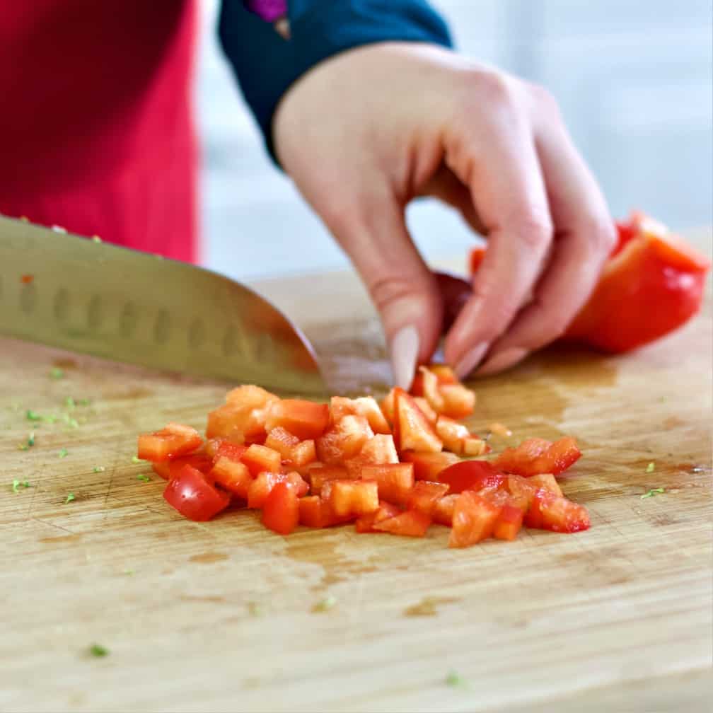 Italian Chopped Salad Recipe 9 Chopping A Red Bell Pepper