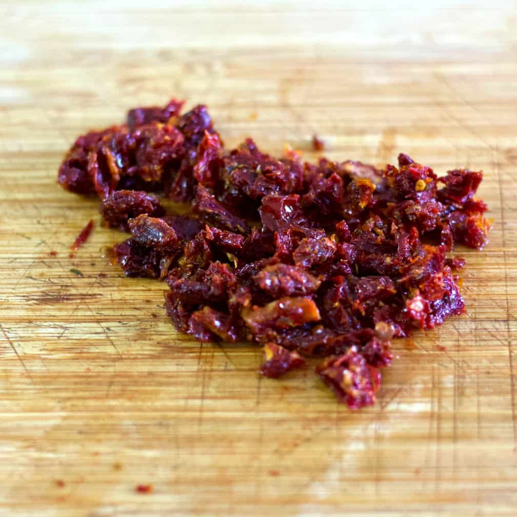 Italian Chopped Salad Recipe 12 Finely Chopped Sun Dried Tomatoes On A Wooden Board.-Cauliflower Salad