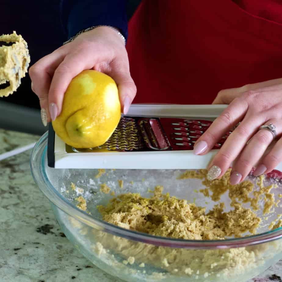 Zesting A Lemon Into Lemon Cookie Bar Dough.