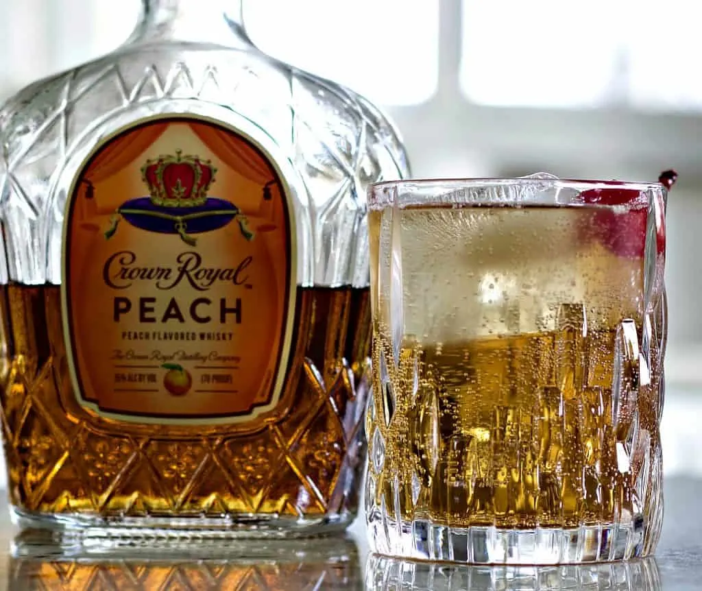 Crown Royal Peaches And Cream Cocktail With Crown Royal Peach Whiskey Bottle