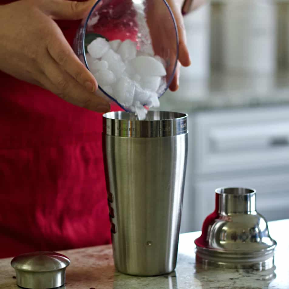 Pouring Ice Into Shaker
