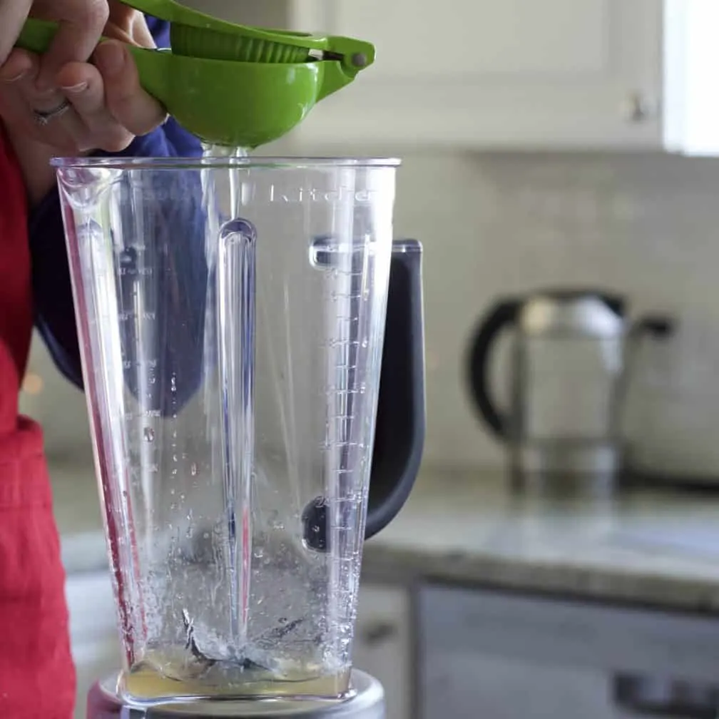 Squeezing A Lime Into A Blender