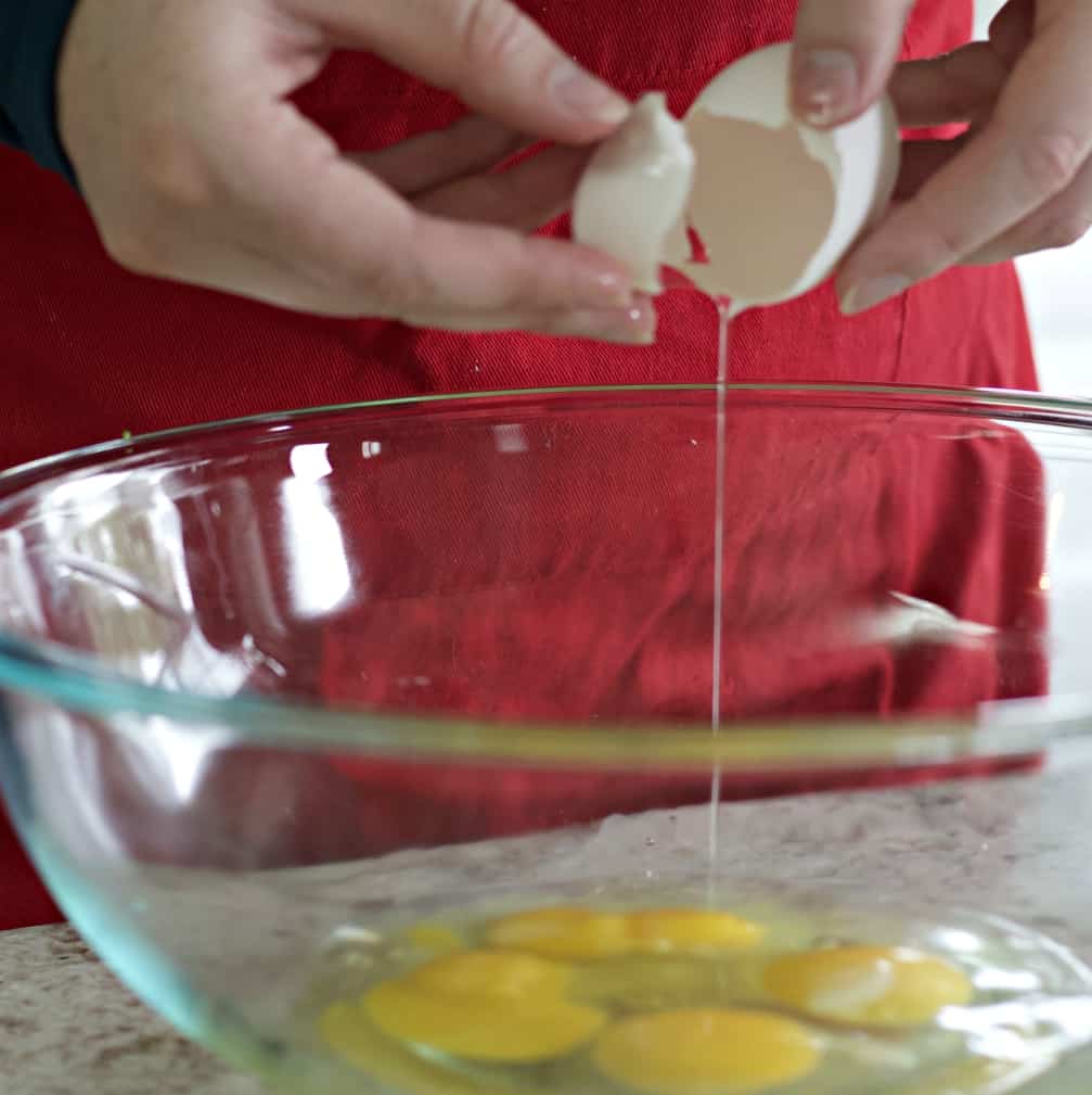 Cracking Eggs Into Bowl-Zucchini Bread