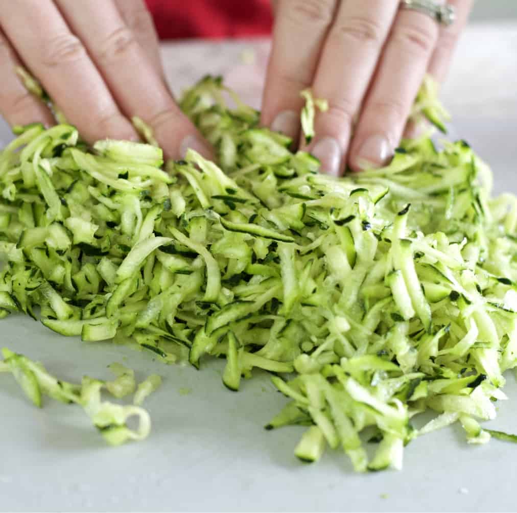 Lemon Zucchini Bread-Farm To Table Recipe 8 Tossing Shredded Zucchini With Sugar
