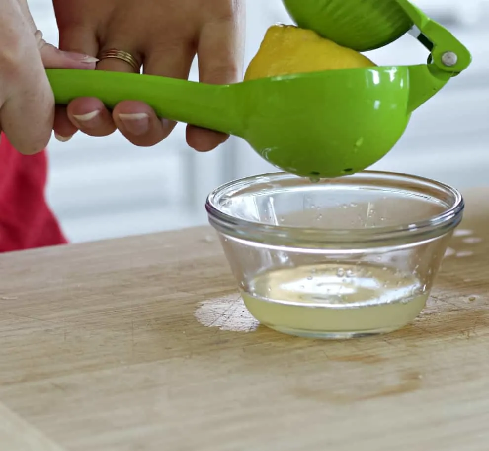 Squeezing Fresh Lemon-Lemon Butter Sauce