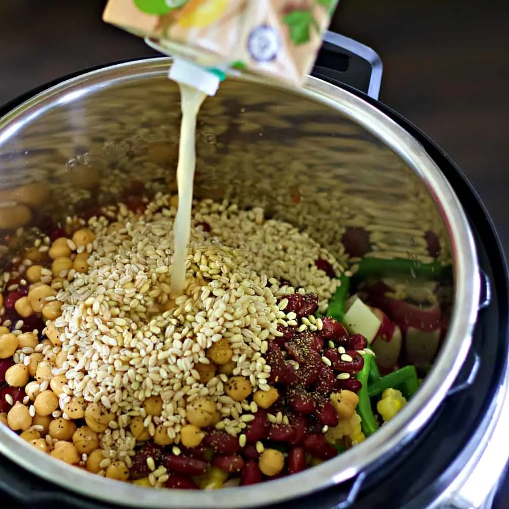 Adding Broth To Vegetable Soup