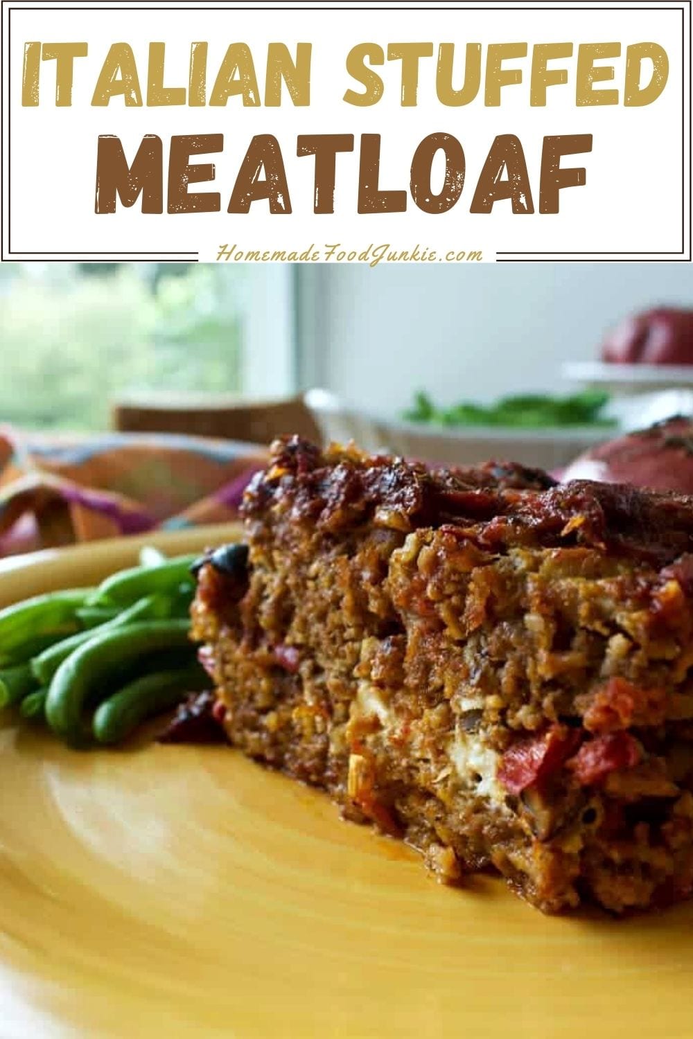 Italian Stuffed meatloaf a rich meatloaf stuffed with Italian marinara sauce and cheese and herbs by HomemadeFoodJunkie.com Italian stuffed meatloaf-pin image