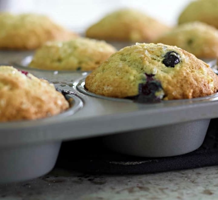 banana blueberry muffin in tin