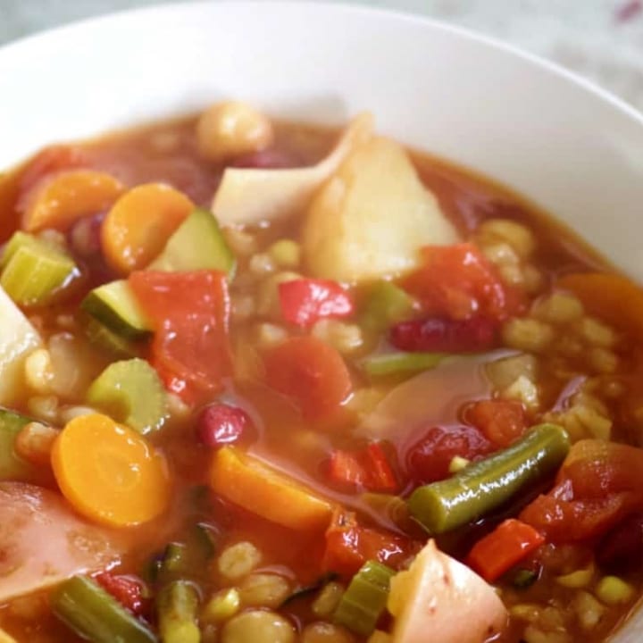 instant pot vegetable soup in white bowl