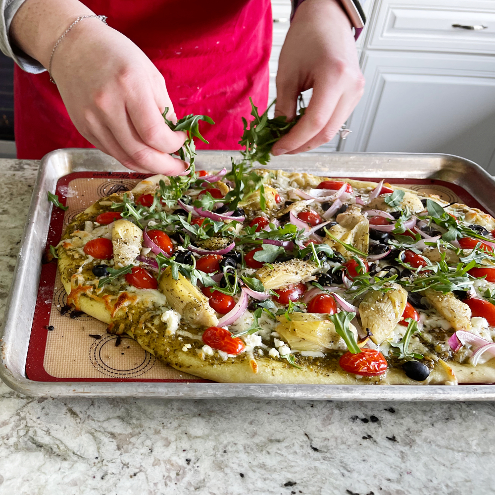 Finishing With Arugula-Mediterranean Flatbread