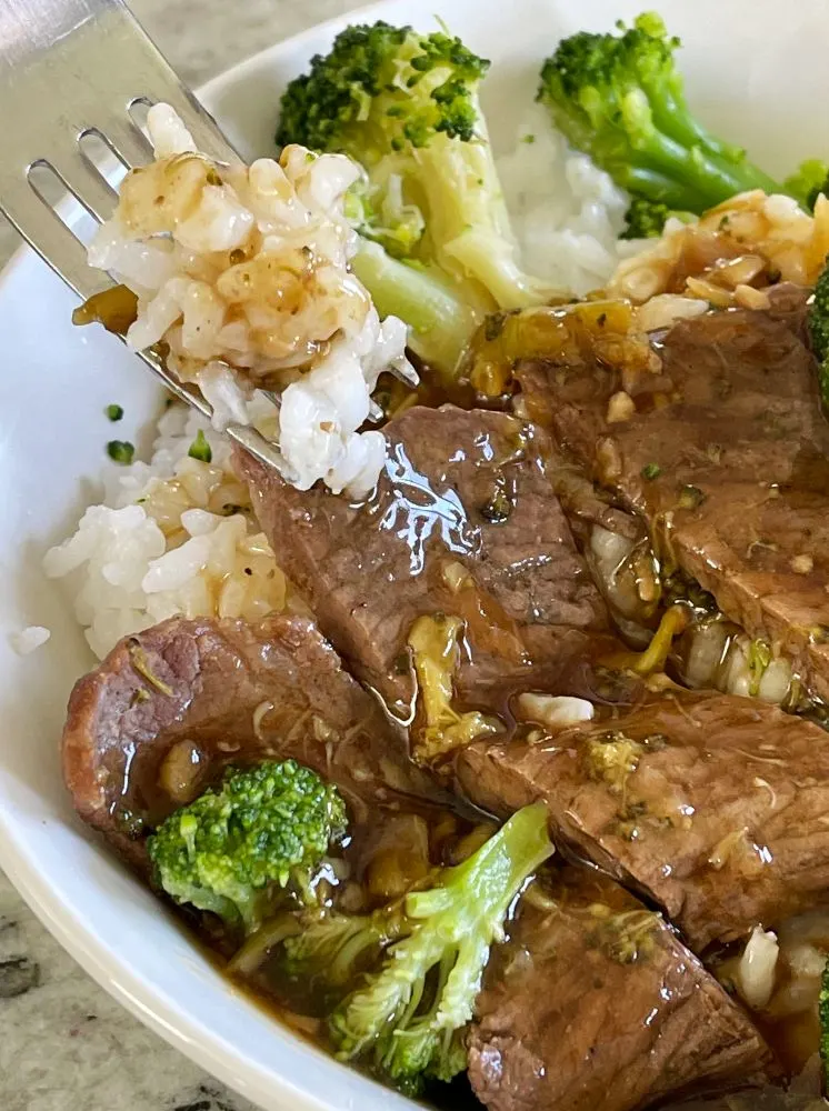 Forkful Of Rice With Asian Sauce Beef And Broccoli Recipe