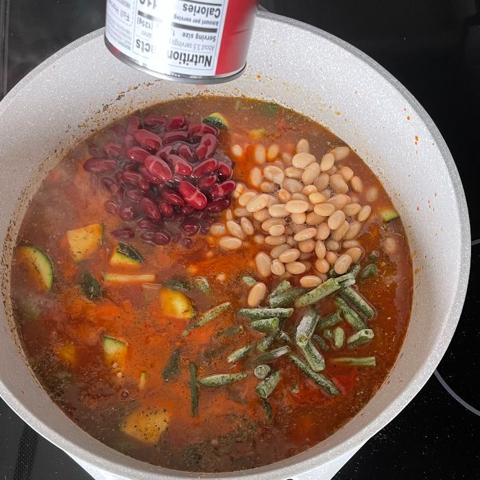 Add Kidney And Great Northern Beans To Pot.